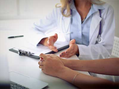 Patient Speaking with Doctor