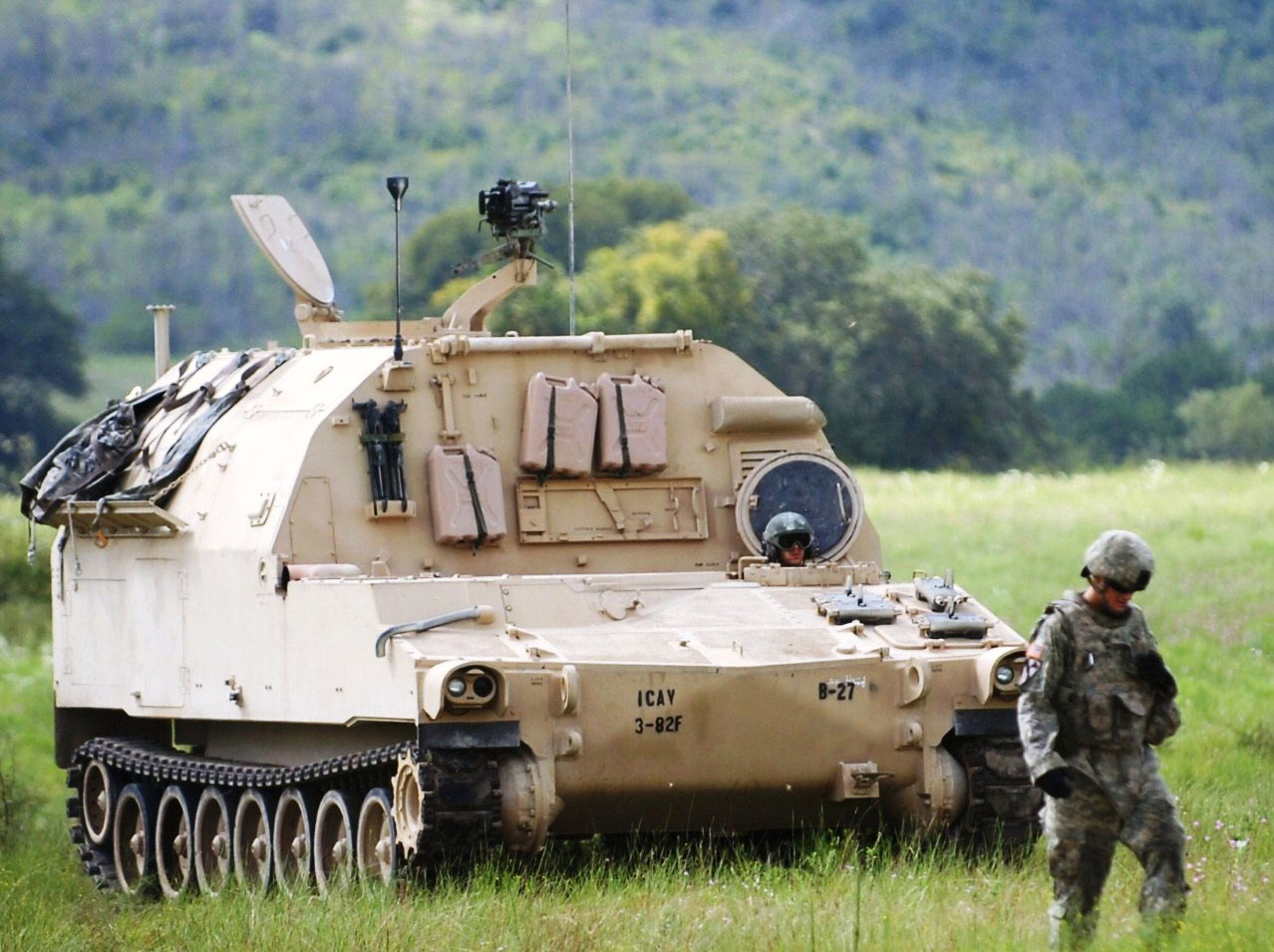 FORT HOOD, Texas— Artillerymen from B. Battery, 3rd Battalion, 82nd Field Artillery Regiment, 2nd Brigade Combat Team, 1st Cavalry Division, move a M992A2 Field Artillery Ammunition Supply Vehicle across the range to a M109A6 Paladin to provide support during the 3rd Bn, 82nd FA Regt.’s Paladin live-fire exercise at a range on Fort Hood, Sept. 22. (U.S. Army photo by Sgt Quentin Johnson, 2nd BCT PAO, 1st Cav. Div.)